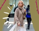 Stylisches Outfit: Ein Oversize-Rollkragenpullover wird lässig über einem langen Kleid getragen. So lässt sich ein Kleid mit Pullover kombinieren im Winter.