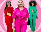 Drei Frauen in auffälligen, monochromen Outfits: Rot, Pink und Grün. Sie präsentieren selbstbewusst ihre Looks.