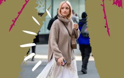 Stylisches Outfit: Ein Oversize-Rollkragenpullover wird lässig über einem langen Kleid getragen. So lässt sich ein Kleid mit Pullover kombinieren im Winter.