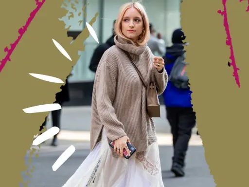 Stylisches Outfit: Ein Oversize-Rollkragenpullover wird lässig über einem langen Kleid getragen. So lässt sich ein Kleid mit Pullover kombinieren im Winter.
