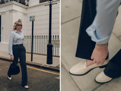 Schicke Loafer sind die perfekte Wahl für 3/4 Hosen. Eine Frau in einem gestreiften Hemd und dunklen Hosen trägt cremefarbene Loafer.