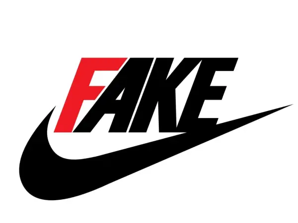 Nike-Logo mit dem Wort "FAKE" in Rot und Schwarz. Ein Hinweis auf gefälschte Jordan 1 Sneaker.